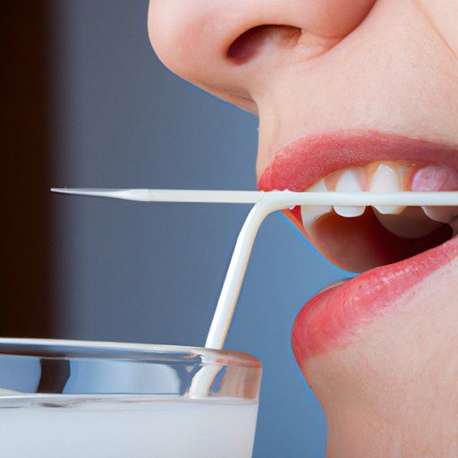 "Close-up of a person holding a straw near their mouth, highlighting the risks of suction after wisdom teeth removal"
