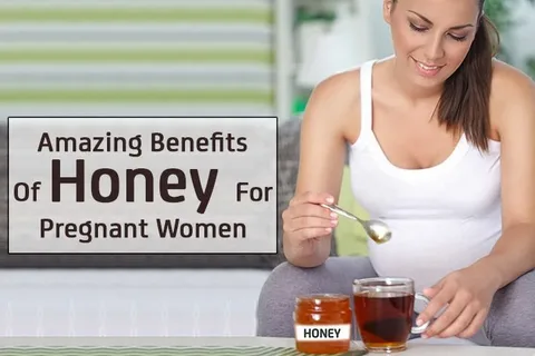 Pregnant woman sitting comfortably while adding honey to a cup of tea, highlighting the benefits of honey during pregnancy for immunity, energy, and digestion.