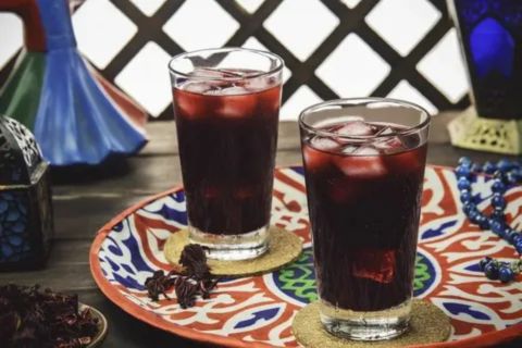 “Non-alcoholic drink served indoors on a decorative tray, representing restrictions on public drinking and alcohol laws in Abu Dhabi.”